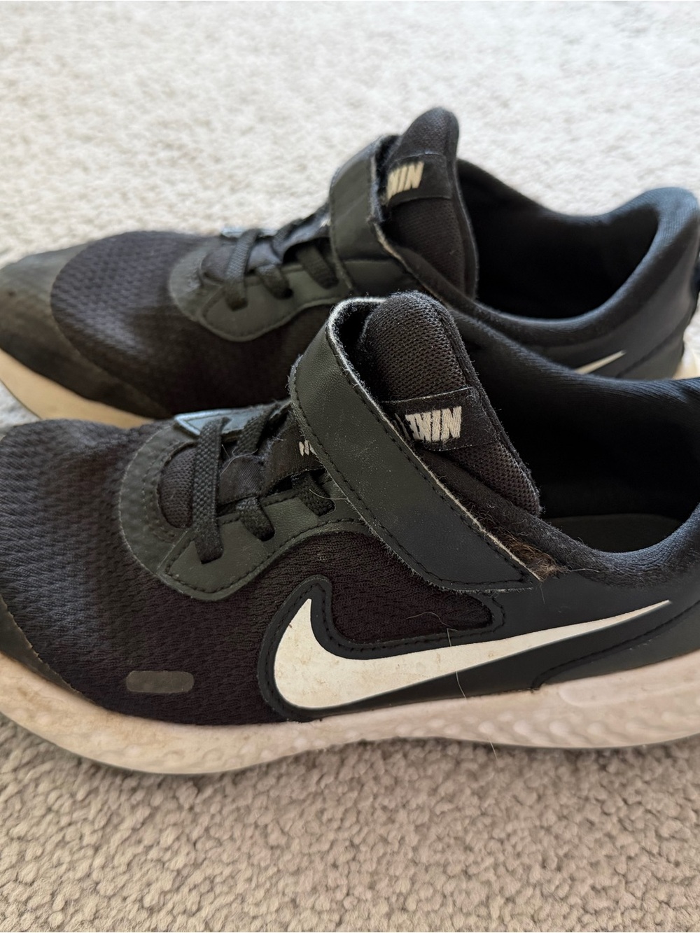 Nike Kids Black Sneakers with White Swoosh and Hook-and-Loop Strap
